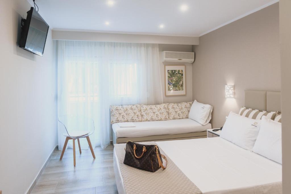 AMMOS BEACH SEASIDE LUXURY SUITES